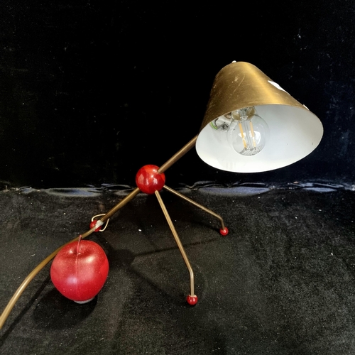 604 - A fantastic example of a mid century Otto Kolb desk lamp in a brass tone finish. Its a beauty.