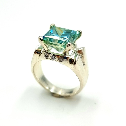 700 - An attractive huge Topaz and Diamond sterling silver ring. Size: V.  beautiful stone and a large hea... 