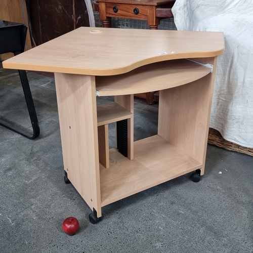 727 - A beech wooden corner unit desk on wheels and extendable shelf for keyboard and circular cable organ... 