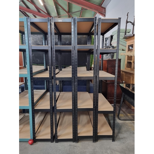 729 - Four industrial shelves with five shelves each and black metal frames. Shelves are adjustable in hei... 