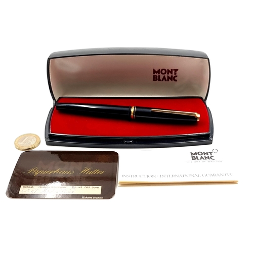 747 - Star Lot : A fabulous Mont Blanc fountain pen, gloss black with gold tone with a 14k gold nib with o... 