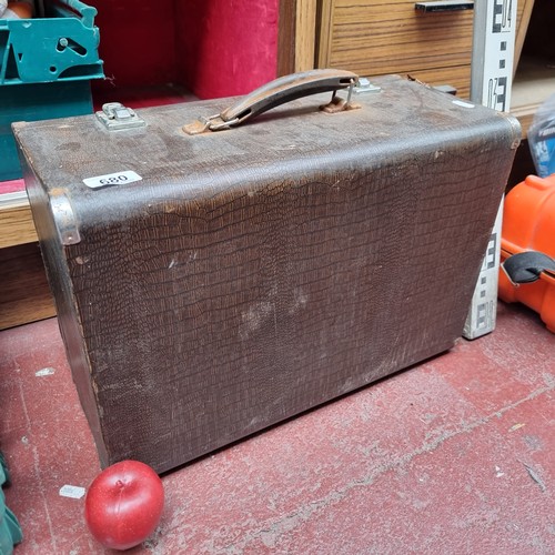 680 - An antique Victorian portable Singer sewing machine model 99K complete with footpedal and three pin ... 