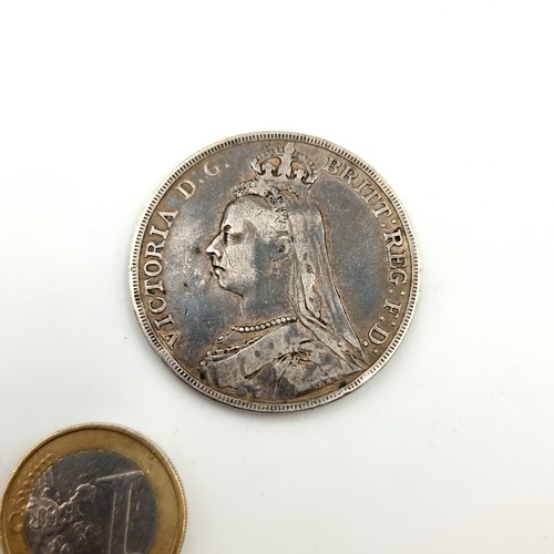 1 - A sterling silver Queen Victoria Jubilee coin, dated 1891. Weight: 27.8 grams. Coin in fine conditio... 