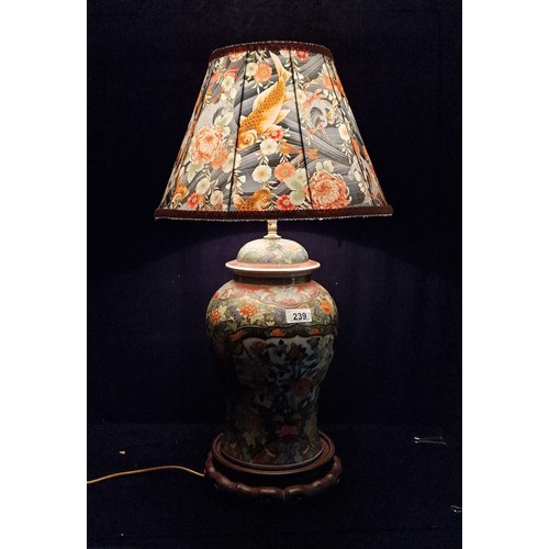 239 - A splendid, very impressive large table lamp with highly ornate Chinese motif porcelain base on a wo... 