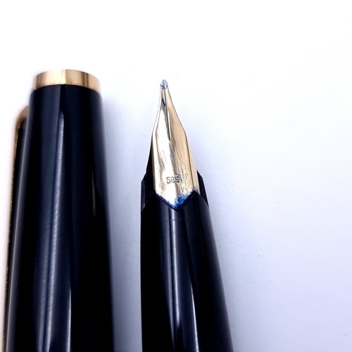 747 - Star Lot : A fabulous Mont Blanc fountain pen, gloss black with gold tone with a 14k gold nib with o... 