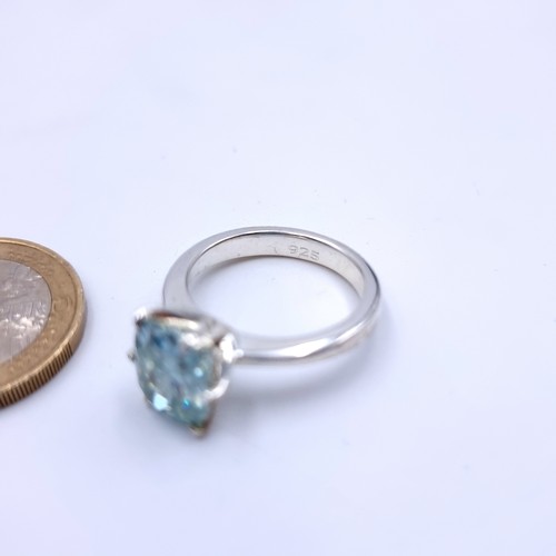 702 - A stunning sterling silver facet cut Blue Topaz ring. Ring size: P. 144  New from the gem company RR... 