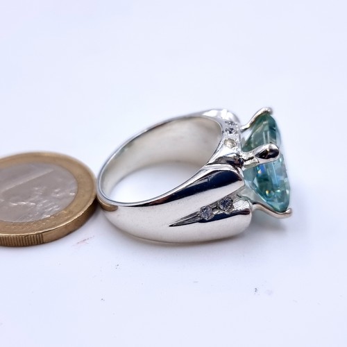 700 - An attractive huge Topaz and Diamond sterling silver ring. Size: V.  beautiful stone and a large hea... 