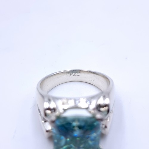 700 - An attractive huge Topaz and Diamond sterling silver ring. Size: V.  beautiful stone and a large hea... 