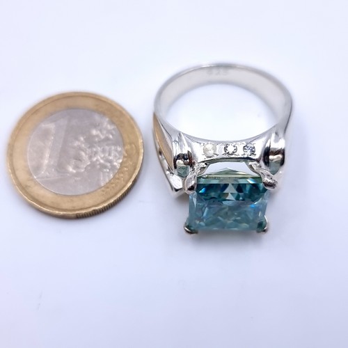 700 - An attractive huge Topaz and Diamond sterling silver ring. Size: V.  beautiful stone and a large hea... 