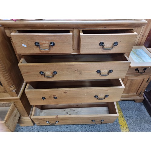 382 - Star Lot : A farmhouse antique pine chest of drawers, with four deep drawers, carved reeded decorati... 