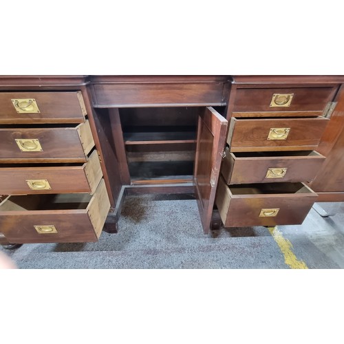 387 - A beautiful, highly elegant, large  sit in dressing table. Boasting an arched tilt top central mirro... 