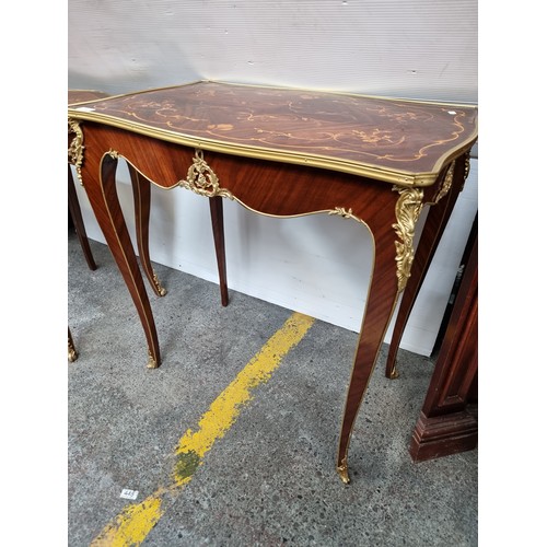 396 - Star Lot L: A highly elegant Louis XV style console table with rich floral marquetry to top and exte... 