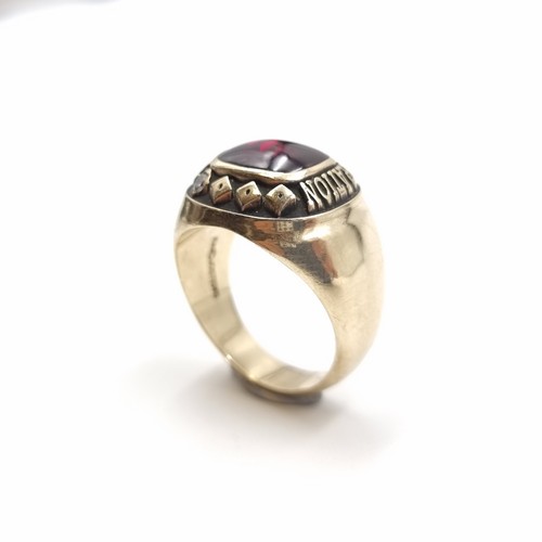 509 - Star Lot: An exceptional antique 10 carat Yellow Gold Gents ring, with a centre vivid Tourmaline and... 