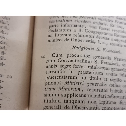 228 - An antique hardback book including a Latin language''Biblotheca Canonica Iurdica Moralis Theologica'... 