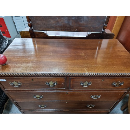 361 - Star Lot : A beautiful Georgian Mahogany chest of five drawers. With pierced brass drop ring handles... 