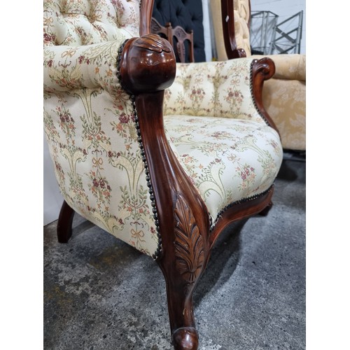 469 - A beautiful Victorian style armchair with lovely curves throughout the carved mahogany frame. Uphols... 