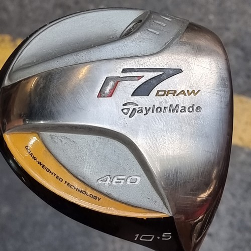 317 - A tailor made titanium R7 Draw golf driver. Including headcover.