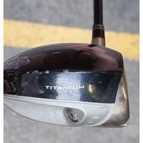 317 - A tailor made titanium R7 Draw golf driver. Including headcover.