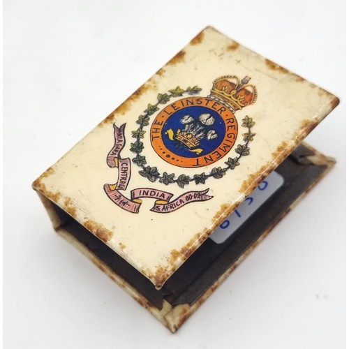 741 - Two items including A boar war Leinster Regiment, Matchbox holder, South Africa 1902 and a Cross pen... 