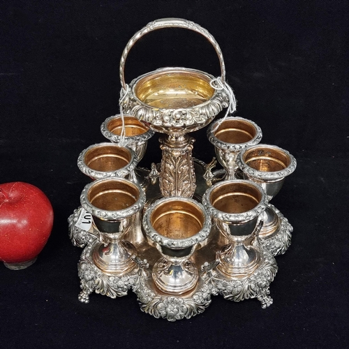101 - A gorgeous, very lavish Victorian silver plated egg cruet frame with seven removable egg cups each h... 