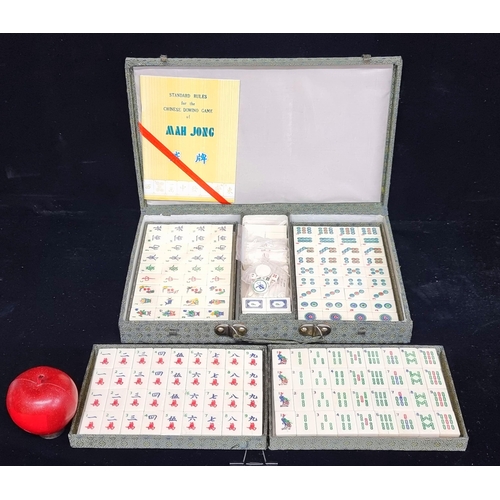 115 - A  new in box Mah Jong Chinese game. A complete set, in a pretty presentation shagreen style  box an... 