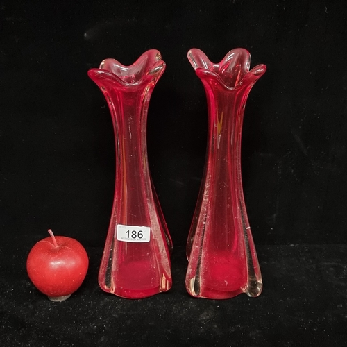 186 - A pair of handblown, art glass vases with a beautiful organic form, and ruby glass colour palette. I... 