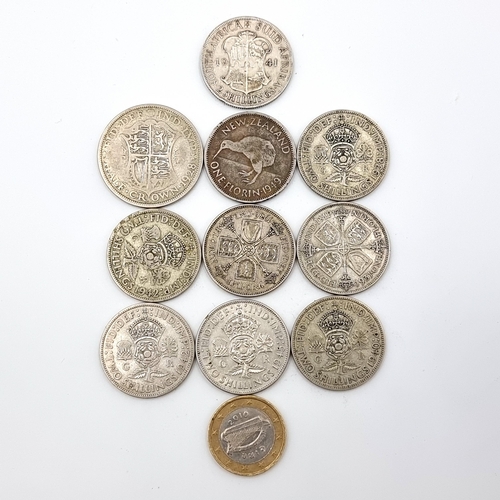 25 - A collection of eight United Kingdom coinage, this collection includes mostly examples with silver c... 