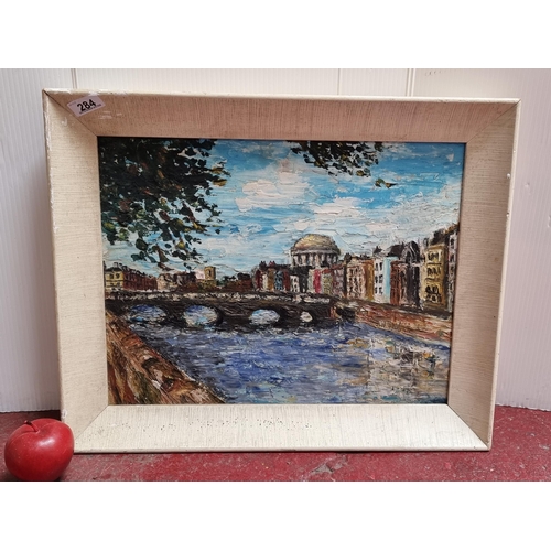 284 - A vibrant early 20th century original oil on canvas board painting featuring a view of the river Lif... 