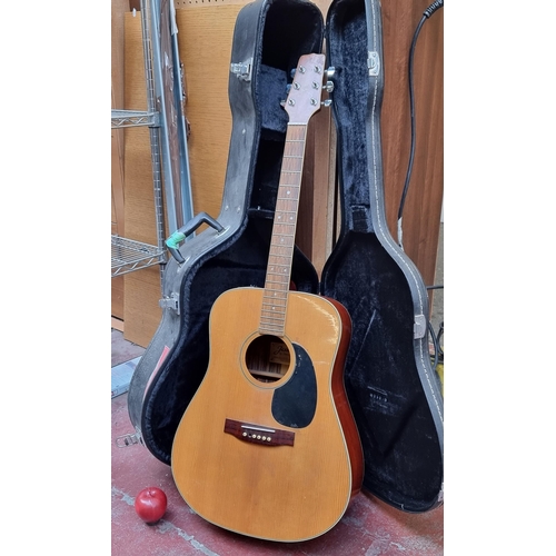 343 - An electric-acoustic guitar in the Jasmine series, Takamine Model TS-60. With pretty ivorine inlay d... 