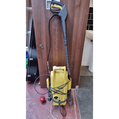 345 - A Kärcher Pressure Washer K2.36M, with extendable wash head. Current models retailing at €135 on vik... 