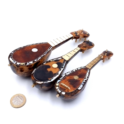 35 - An excellent collection of three antique 19th century inlayed Tortoiseshell Mandolins each featuring... 