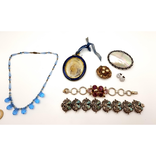 38 - A collection of seven pieces of vintage costume jewellery, including examples of semi precious stone... 