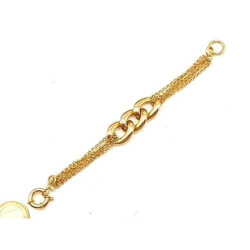 49 - A beautiful example of a sterling silver, silver gilt six strand chain link bracelet.