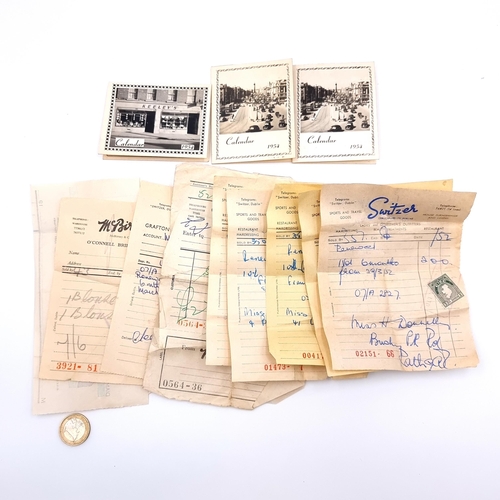 540 - A collection of vintage mid century purchase receipts, from well known stores such as Switzer and Mc... 