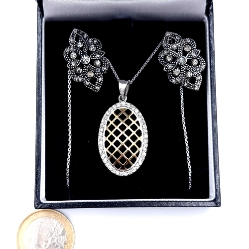 545 - A very pretty Gold lattice design pendant gemstone necklace. Length: 42cm. Accompanied by a pair of ... 