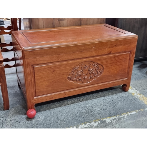 563 - Star Lot : A fabulous Chinese rosewood large carved storage chest with cedar interior. With dragon m... 