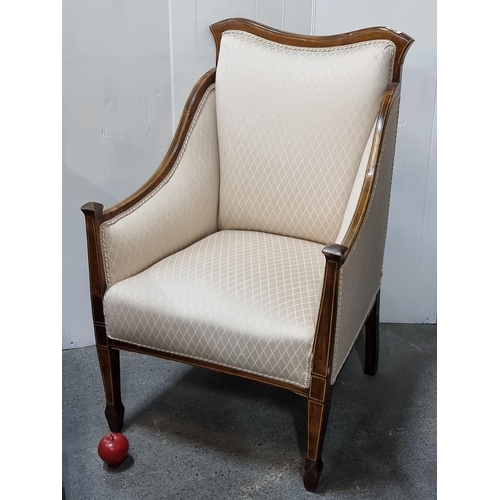 668 - Star Lot : A stylish Edwardian armchair with beautiful string inlay throughout. Elegantly shaped and... 