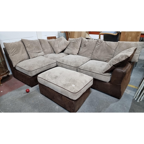 671 - A large corner sofa with plush taupe cushions and dark brown leather base. Includes accompanying foo... 