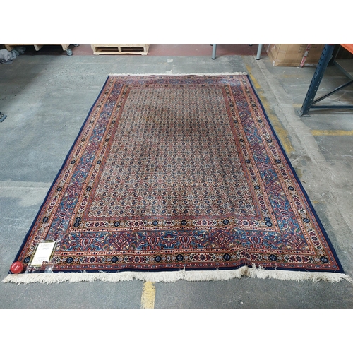 674 - Star Lot : A fabulous 100% wool, hand made and hand knotted Persian rug with very intricate foliate ... 