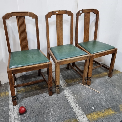 688 - Three Art Deco chairs with fluted back detail upholstered in a green leather. Nice and clean with cl... 