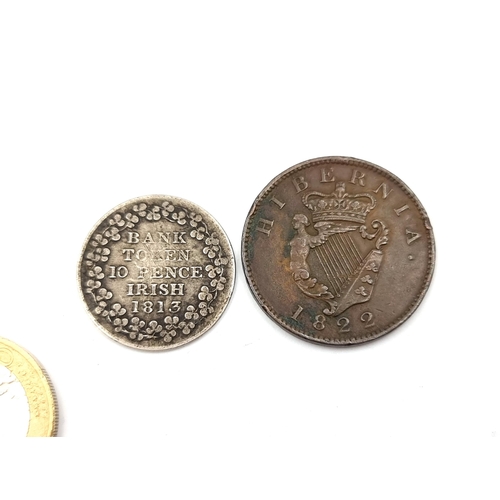 844 - Two good Irish coins inc a Silver 1813 Bank Token and a very clean 1822 Irish George 4th Penny.