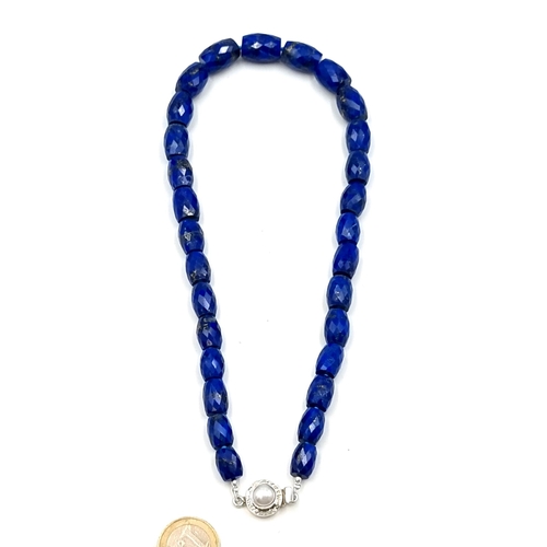 857 - Star Lot ; A fabulous natural Lapis Lazuli 500 cts Gemstone necklace with a large Sterling Silver Cl... 