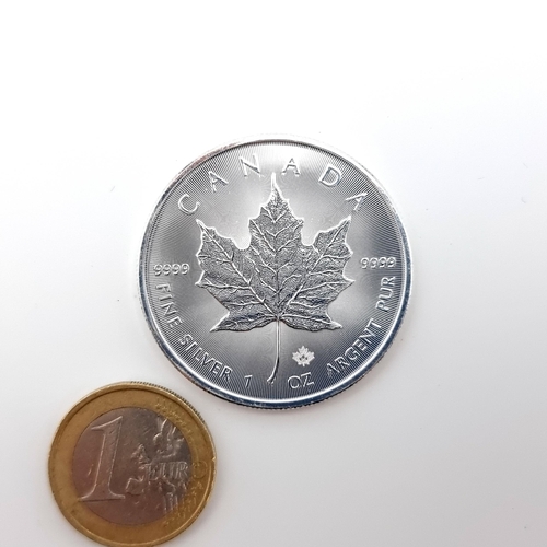 9 - A 1 ounce fine .999 silver Canadian five dollar coin, profiling the late Elizabeth II dated 2020. In... 