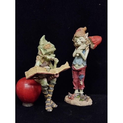97 - A charming pair of imps, including one clutching a colourful mushroom, while the other is engrossed ... 