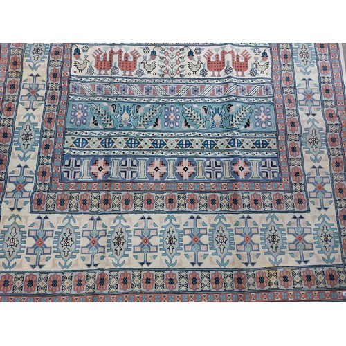 673 - Star Lot : A lovely large hand made and hand knotted low pile 100% wool floor rug with geometric des... 