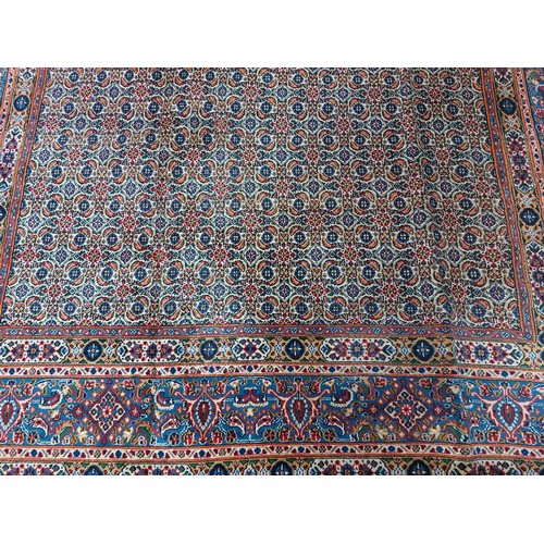 674 - Star Lot : A fabulous 100% wool, hand made and hand knotted Persian rug with very intricate foliate ... 