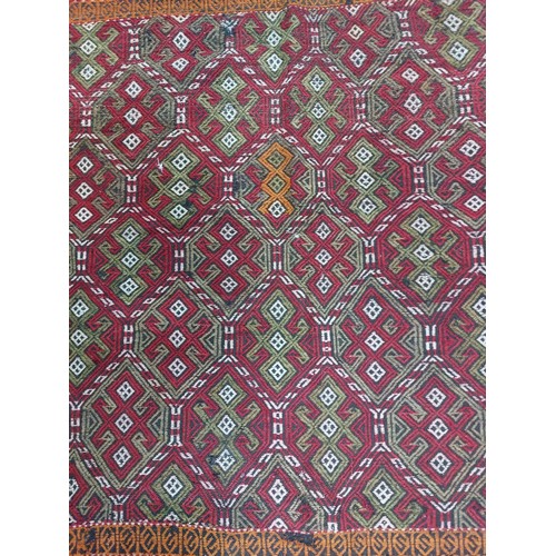 653 - Star Lot : A beautiful Anatolian hand made, hand knotted rug with tribal style design in red and ora... 