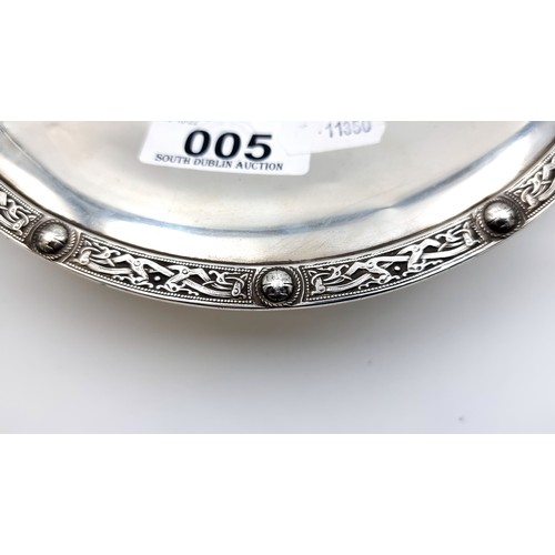5 - Star Lot : A very attractive footed Sterling silver dish, with a super Celtic design rim and engrave... 