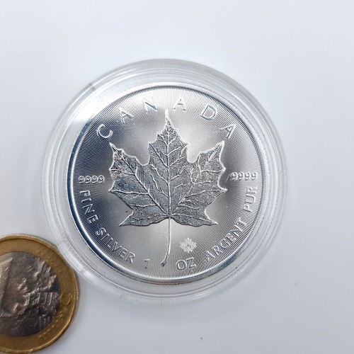 8 - A 1 ounce fine .999 silver Canadian five dollar coin, profiling the late Elizabeth II dated 2020. In... 