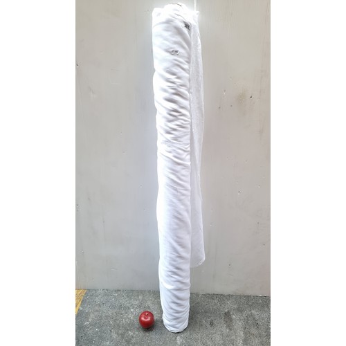 381 - A large bolt of high quality white muslin fabric.